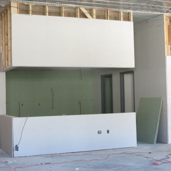 Sheetrock up in the service desk area